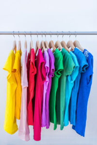 Colorful shirts on a rack